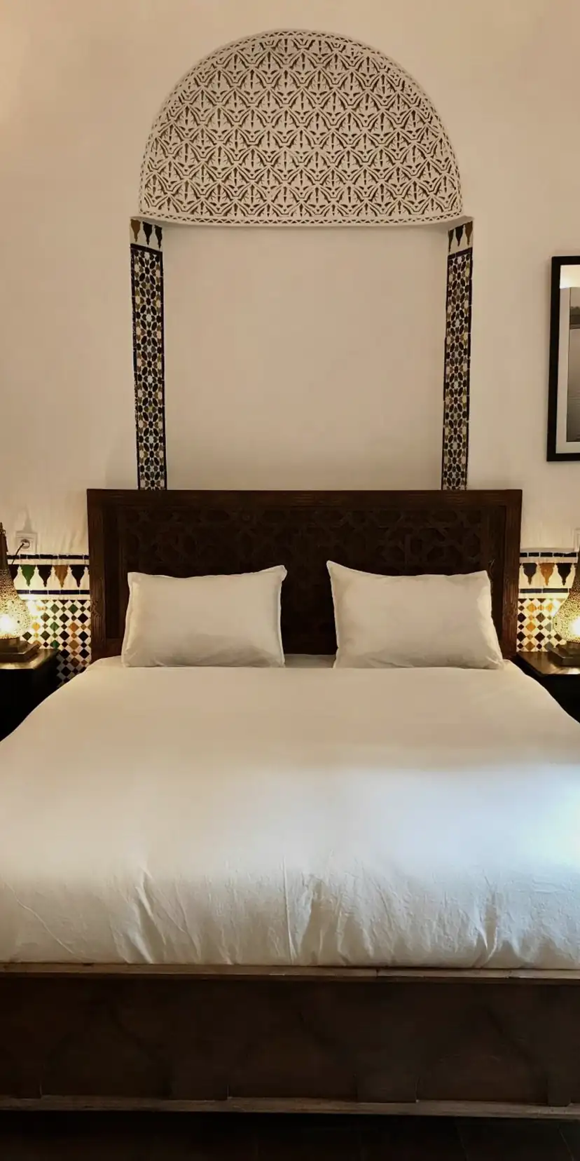 Chambre Triple Deluxe, le lit sous la niche de plâtre