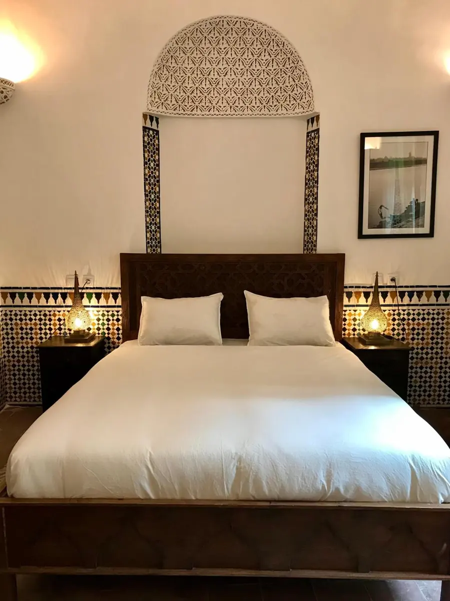 Chambre Triple Deluxe, le lit sous la niche de plâtre