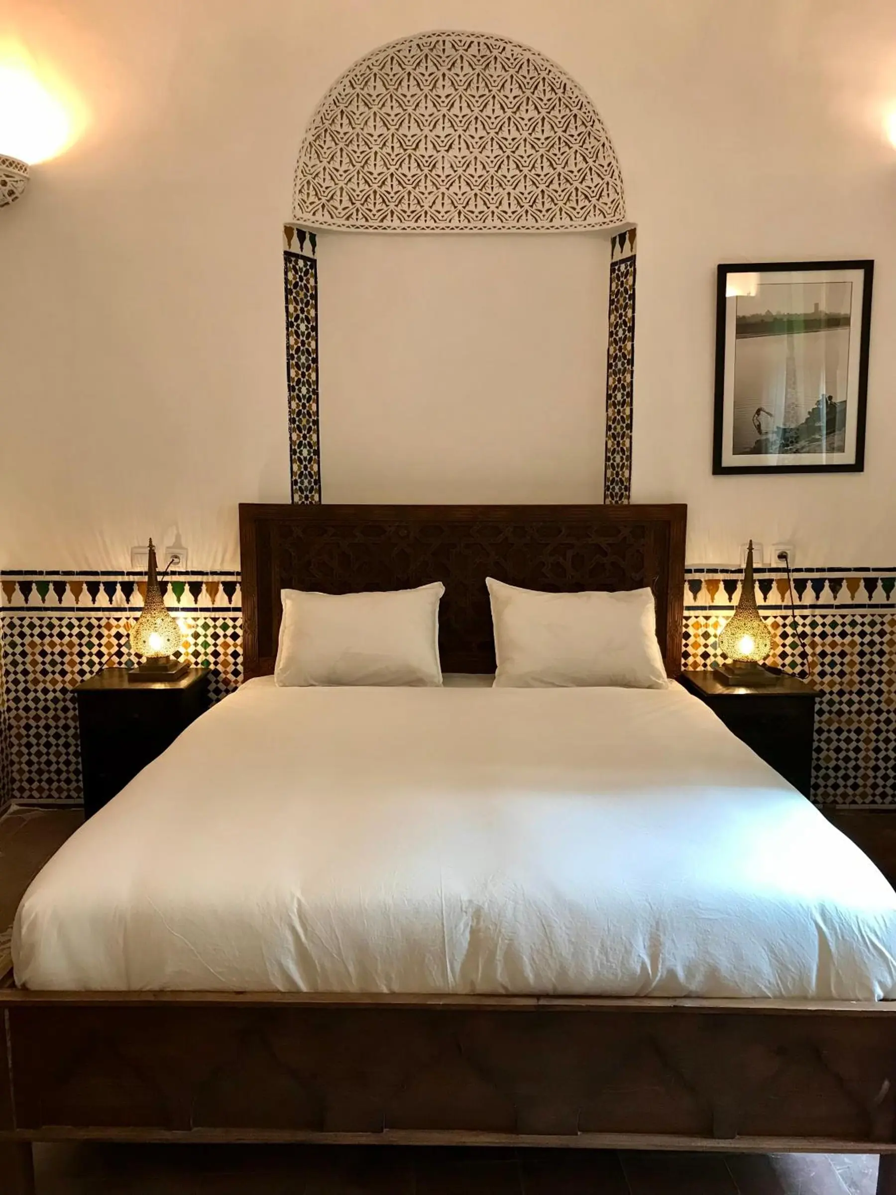 Chambre Triple Deluxe, le lit sous la niche de plâtre